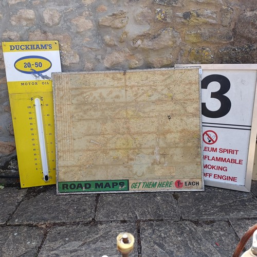 109 - A Duckhams Oil enamel forecourt thermometer, a road map 76 x 92 cm, and another sign (3)