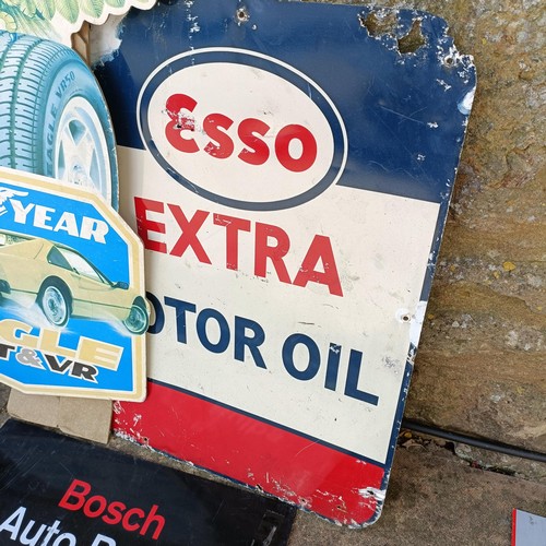 274 - An Esso Extra Motor Oil sign, 61 x 48 cm, and two other signs (3)