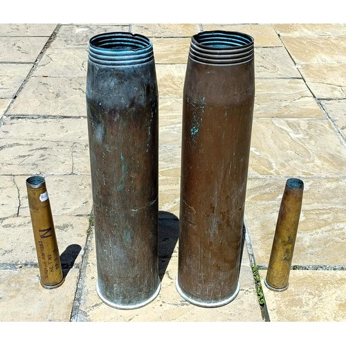 322 - A pair of brass shell cases, 65 cm high, and two others (4)