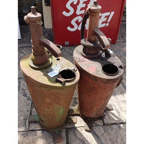 338 - Two forecourt oil dispensers, 68 cm high (2)