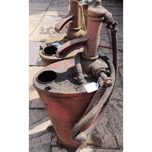 338 - Two forecourt oil dispensers, 68 cm high (2)