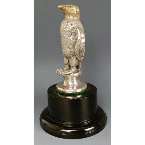 380 - An accessory car mascot, in the form of a penguin, by A E Lejeune, plated on brass, 1920s, on a mode... 