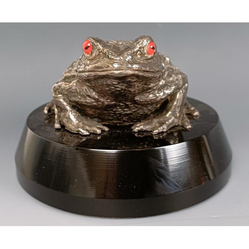 384 - A C Paillet Toad mascot, with nickel plated finish, signed Ch. Paillet and dated 1919, with red glas... 