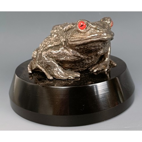 384 - A C Paillet Toad mascot, with nickel plated finish, signed Ch. Paillet and dated 1919, with red glas... 