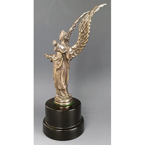 394 - A winged angel accessory mascot, the angel with hands in a welcoming pose, nickel plated on brass, d... 