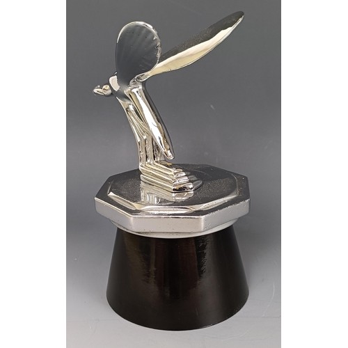 402 - A reproduction MG Midget Mascot, chrome plated, fitted to a period MG octagonal radiator cap, on a l... 