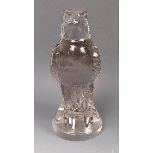 404 - An Art Deco glass Falcon car mascot, by Rene Laliq, moulded R Lalique and engraved France, in good o... 