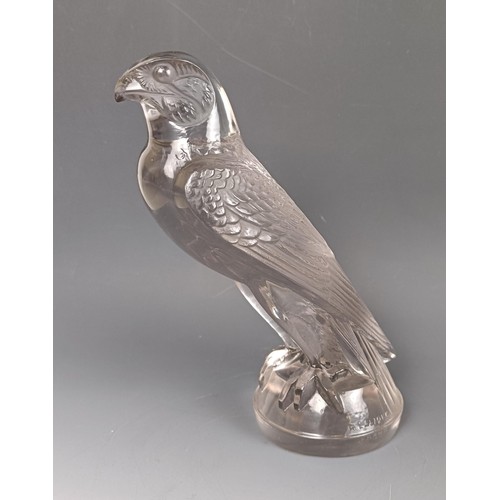 404 - An Art Deco glass Falcon car mascot, by Rene Laliq, moulded R Lalique and engraved France, in good o... 