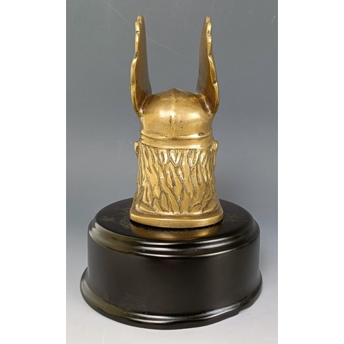 410 - A Rover brass mascot, on a modern base, 14.5 cm high, and a group of radiator caps and additional st... 