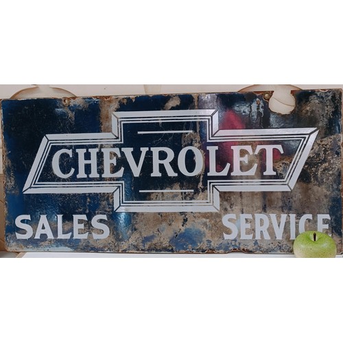 232 - A double sided enamel sign, Chevrolet Sales Service, 76 cm wide Provenance: From the estate of the l... 