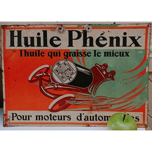 234 - A metal sign, Huile Phenix, 44 cm wide Provenance: From the estate of the late Nick Baldwin