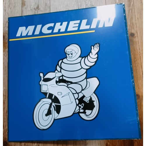 280 - A flanged metal sign, Michelin, with a motorcycle, 45 cm wide, and a plastic light box section, Wood... 