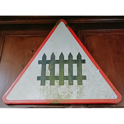 296 - An enamel triangular warning sign, 93 cm wide Provenance: From the estate of the late Nick Baldwin