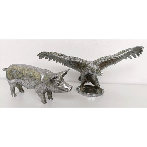 430 - A chrome plated car mascot, in the form of an eagle, wingspan 24.5 cm, and a chrome plated boar, 17.... 