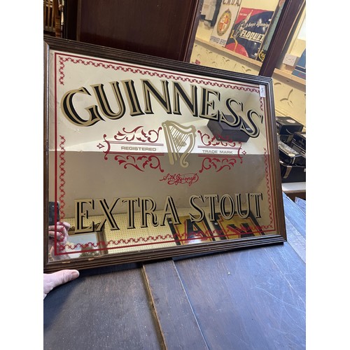 491 - Assorted Guinness pub beer pump finials, a Guinness dartboard, two banners, assorted reproduction en... 