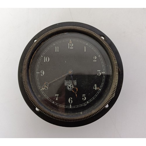 463 - A dashboard clock, two Mack emblems, a Volcan and other items Provenance: From the estate of the lat... 