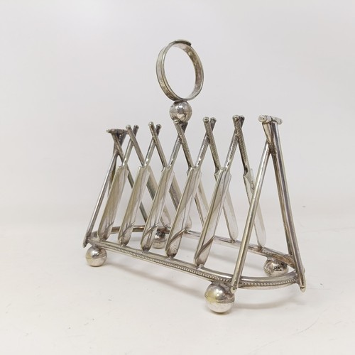 707 - A late Victorian silver plated novelty toast rack, the divisions in the form of cricket bats, 18 cm ... 