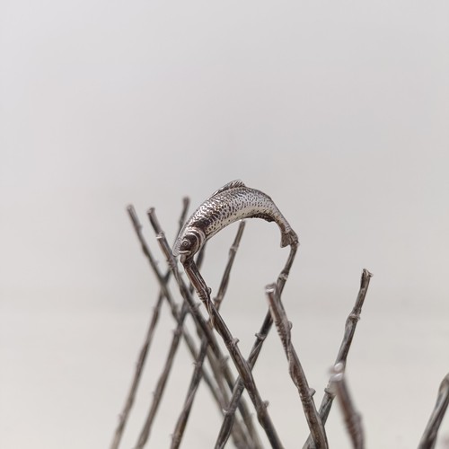 708 - A late Victorian silver plated novelty toast rack, the divisions in the form of fishing rods and ree... 