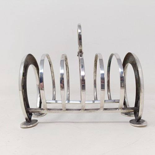 709 - A late Victorian silver plated novelty toast rack, the ends in the form of horseshoes, 14 cm wide