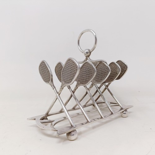 711 - A late Victorian silver plated novelty toast rack, the divisions in the form of tennis racquets, 16 ... 