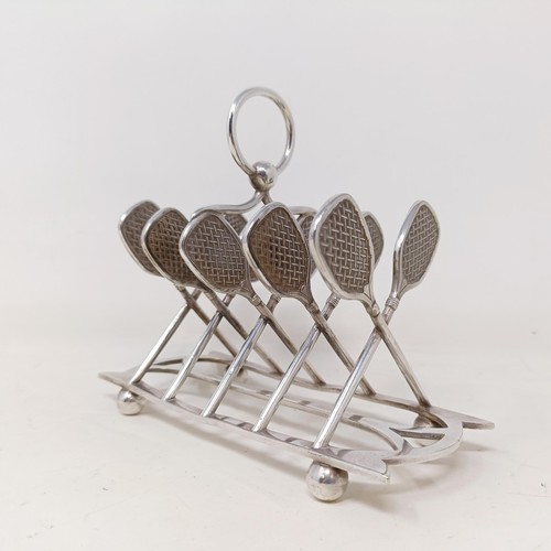 711 - A late Victorian silver plated novelty toast rack, the divisions in the form of tennis racquets, 16 ... 