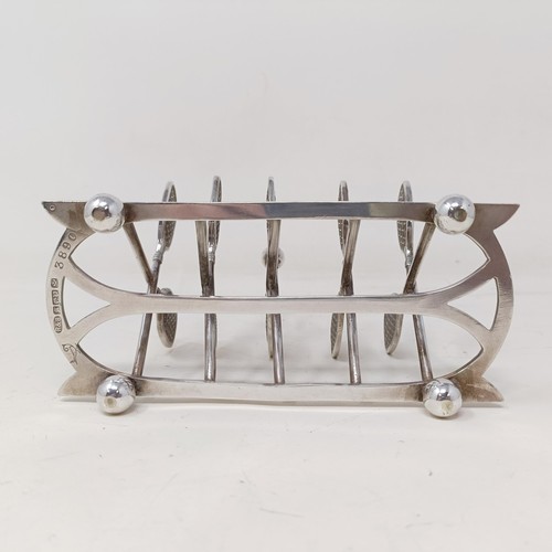 711 - A late Victorian silver plated novelty toast rack, the divisions in the form of tennis racquets, 16 ... 