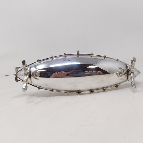 713 - A late Victorian silver plated novelty toast rack, in the form of a rowing boat, the divisions in th... 