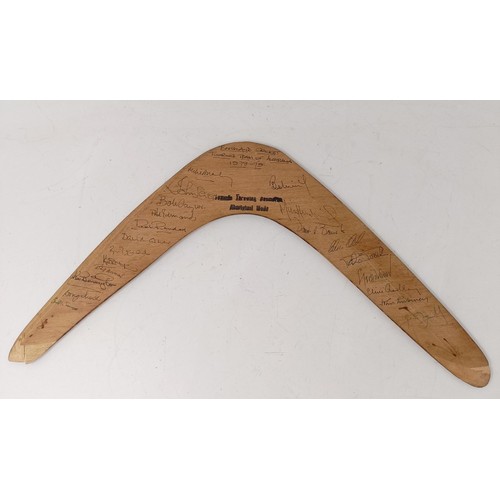 718 - A boomerang, signed by England Cricket Touring Team of Australia, 1978-1979, signatures to include D... 