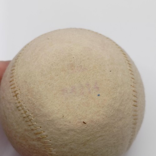 720 - A Victorian novelty travelling inkwell, in the form of a tennis ball, 7 cm diameter