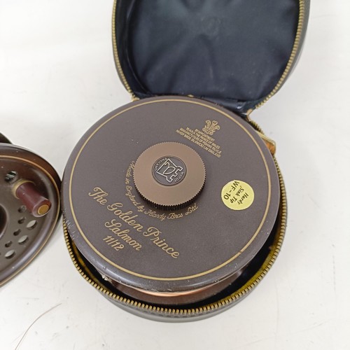 721 - A Hardy limited edition fishing reel, The Golden Prince, Salmon, 11/12, cased and a spare spool (2)