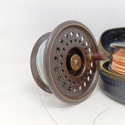 721 - A Hardy limited edition fishing reel, The Golden Prince, Salmon, 11/12, cased and a spare spool (2)