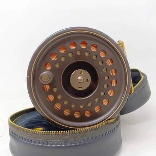 721 - A Hardy limited edition fishing reel, The Golden Prince, Salmon, 11/12, cased and a spare spool (2)