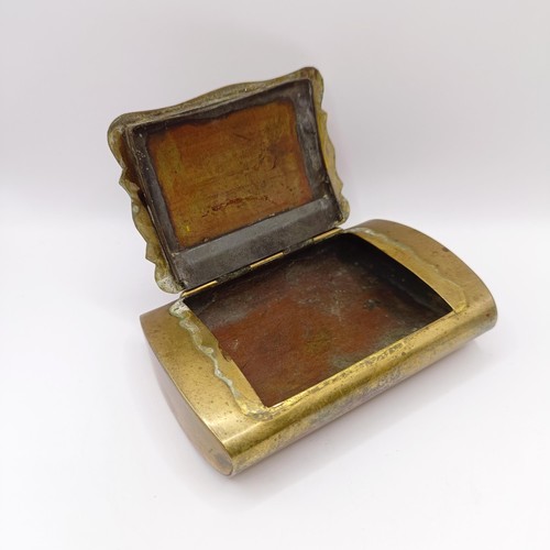 722 - A 19th century brass snuff box, lid engraved with racehorse and rider, 9 cm wide