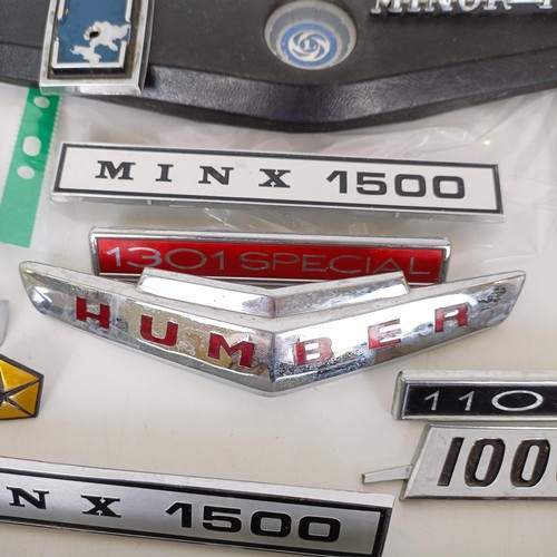 453 - Assorted car badges, including Hillman, Ford, Humber and other various makes