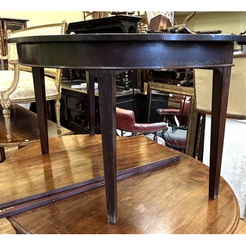 1021 - A mahogany demi-lune side table, 140 cm high