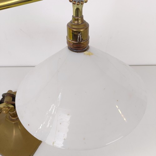 800 - An early 19th century brass adjustable table lamp, on a squared base