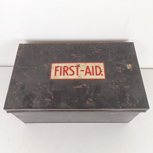 808 - A vintage First Aid box and contents, 30 cm wideProvenance: Sold on behalf of SNCB Charity