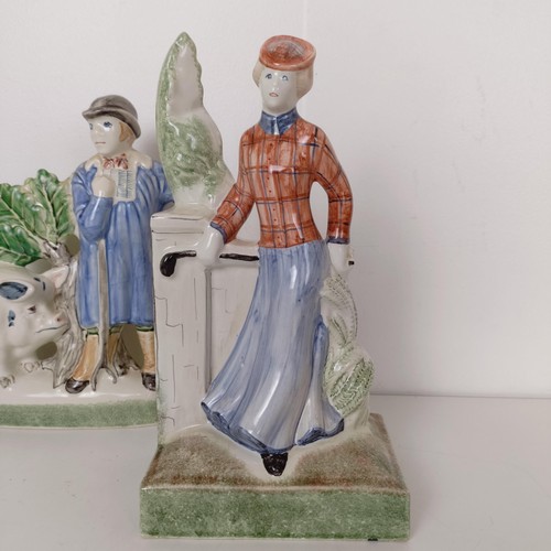 818 - A Rye Pottery figure of a lady, 27 cm high, another of a farmer and sow, 24 cm and other Rye Pottery... 