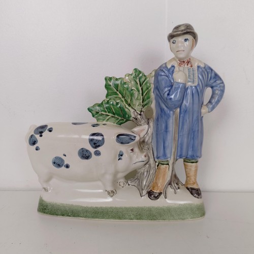 818 - A Rye Pottery figure of a lady, 27 cm high, another of a farmer and sow, 24 cm and other Rye Pottery... 