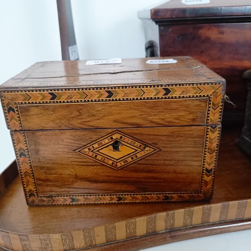 819 - A 19th century rosewood tea caddy, 40 cm wide, a carved oak box, a caddy, a plate stand and a mahoga... 