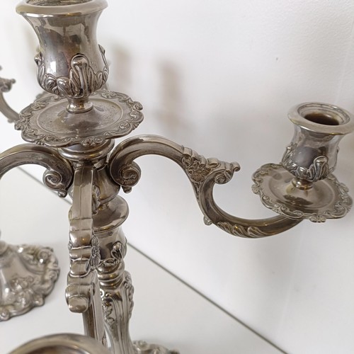 820 - A pair of silver plated four branch candelabra, 47 cm high (2)