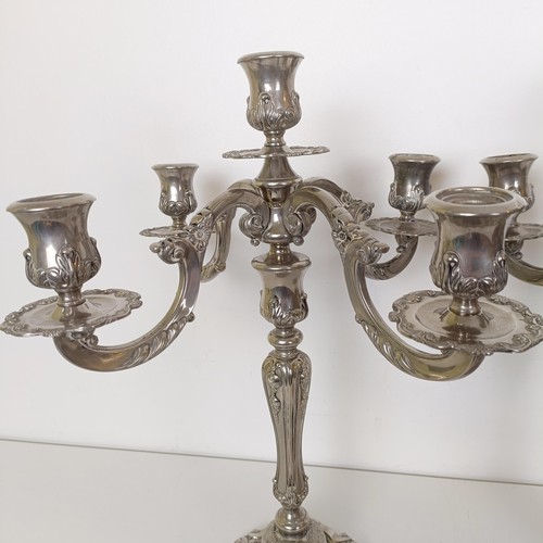 820 - A pair of silver plated four branch candelabra, 47 cm high (2)