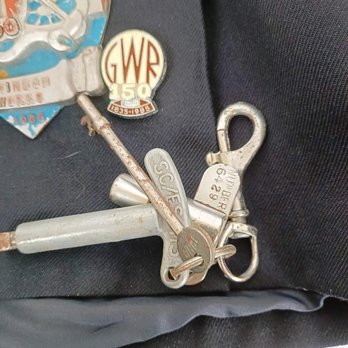 830 - A GWR Swindon Works badge, assorted railway keys, a gauge, and a British Rail jacket (box)