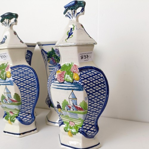 837 - A Delft garniture, comprising three vases with lids, 34 cm high, and a pair of vases, 26 cm high (5)