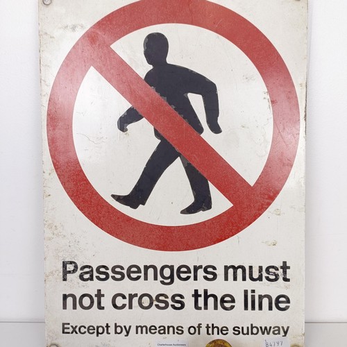 843 - A sign, reading Passengers Must Not Cross The Line Except by Means Of The Subway, 43 x 32 cm, and fo... 