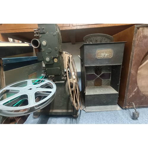 856 - A vintage projector, a gramophone, assorted 78 rpm records and assorted other items (qty)