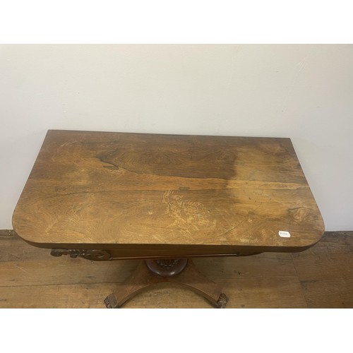 1001 - A 19th century rosewood folding card table, 91 cm wide