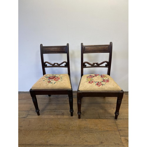 1016 - A mahogany waterfall bookcase, with a drawer to base, 102 cm high x 36 cm wide, and a pair of chairs... 