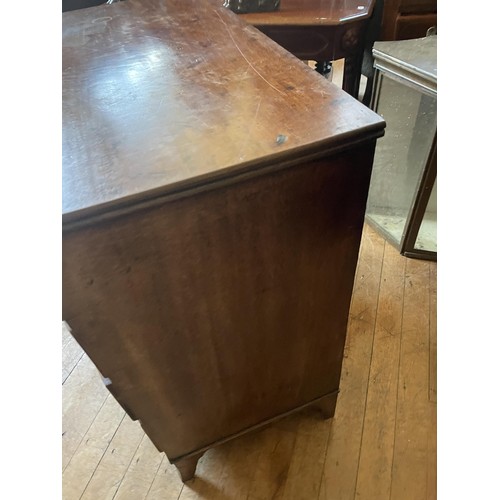 1039 - A mahogany bow front chest, having four drawers, 90 cm wide, and a commode (2)