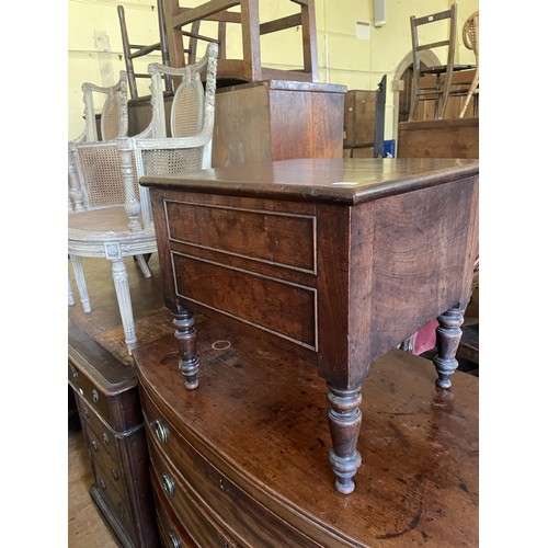 1039 - A mahogany bow front chest, having four drawers, 90 cm wide, and a commode (2)